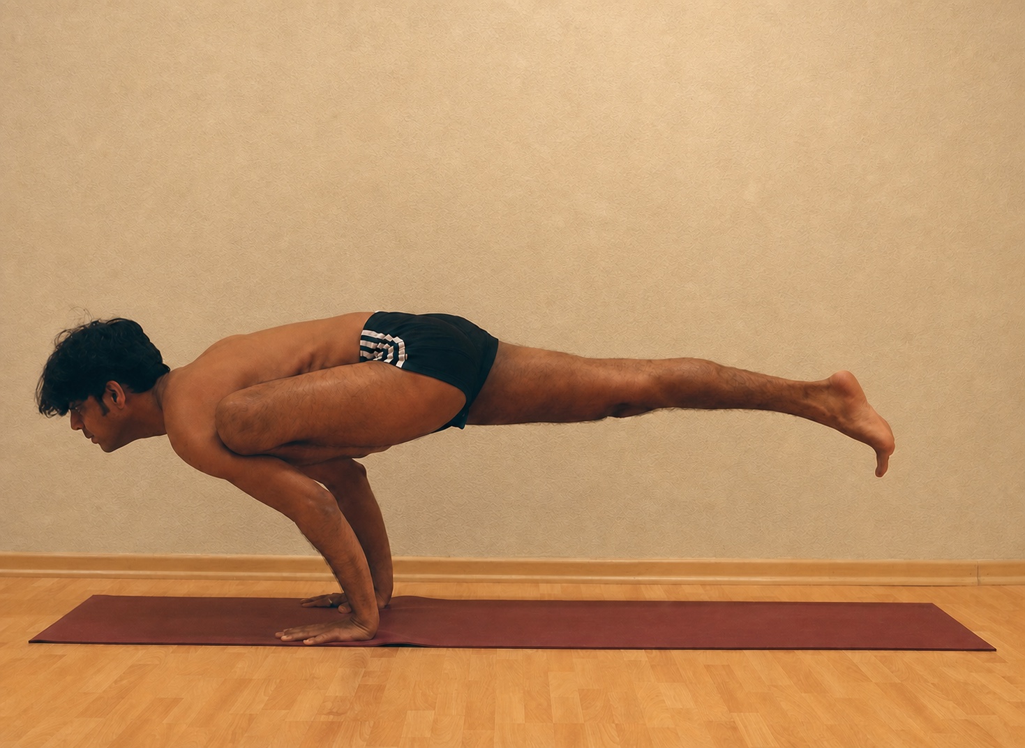 Eka Pada Koundinyasana yoga practice demonstrated by Pankaj