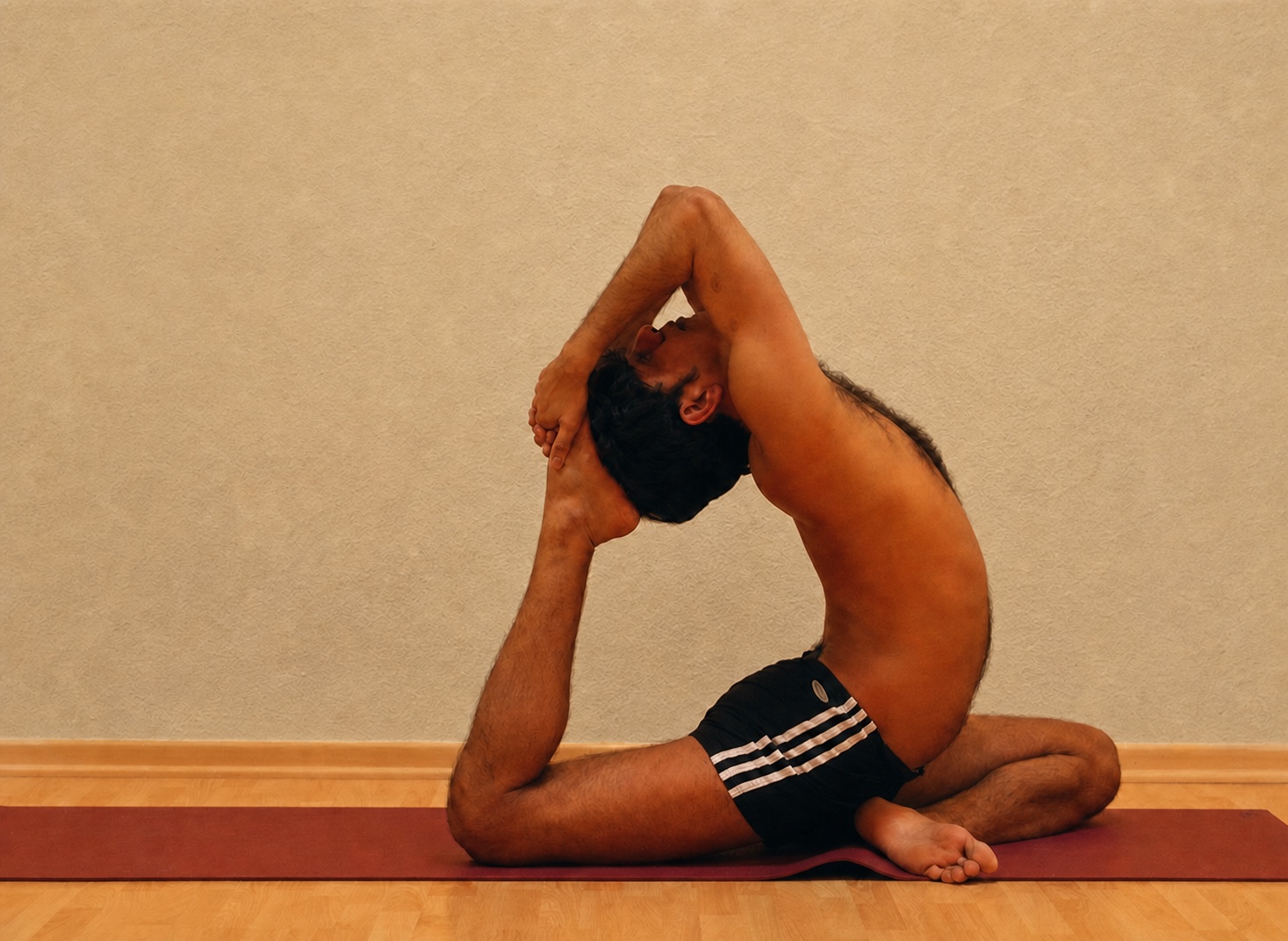 Eka Pada Rajakapotasana yoga practice demonstrated by Pankaj