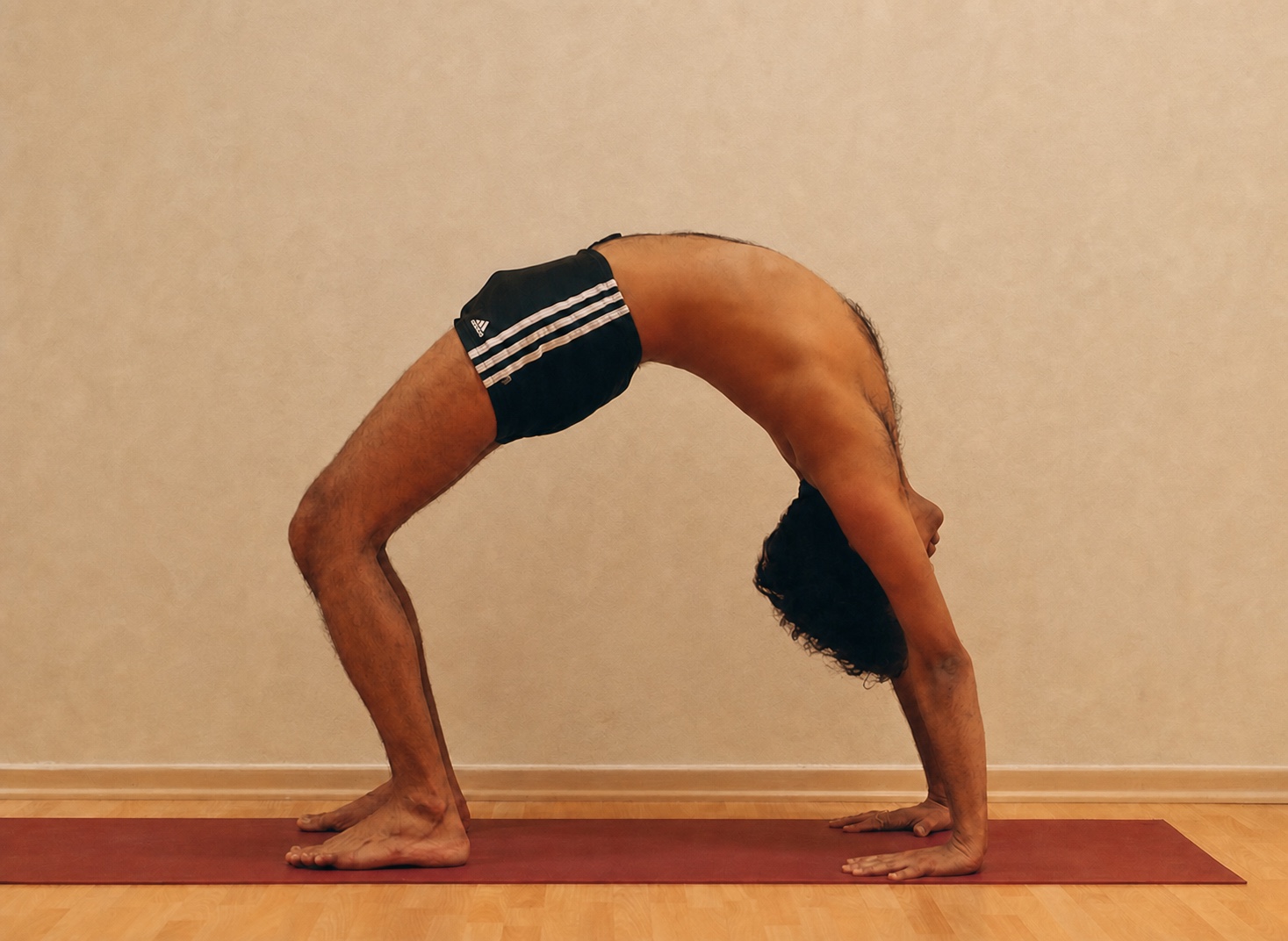 Urdhva Dhanurasana yoga practice demonstrated by Pankaj