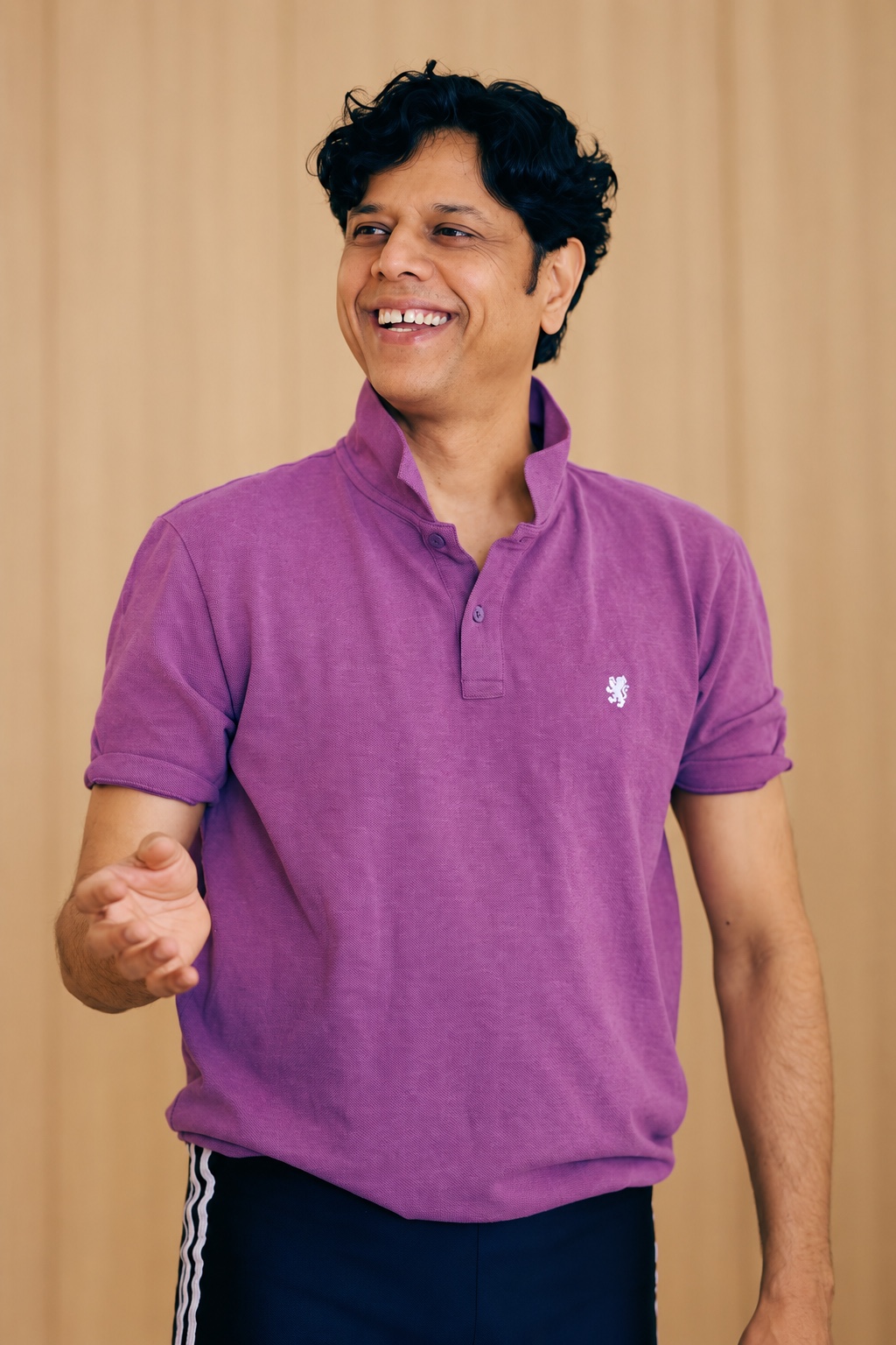 Pankaj smiling while teaching yoga